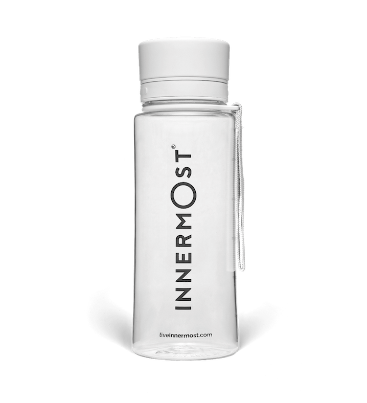 Innermost shaker bottle with a white lid and carry handle