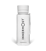 Innermost shaker bottle with a white lid and carry handle